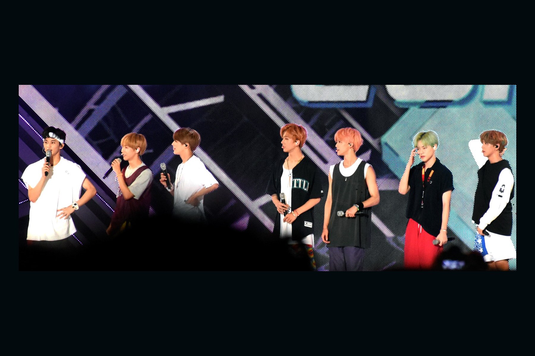 NCT DREAM performing together at Sky Festival in 2018.