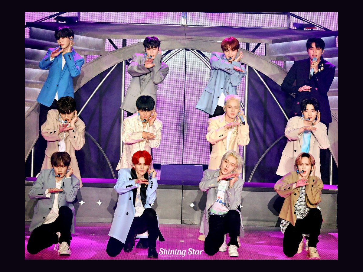 TREASURE members together in 2022.