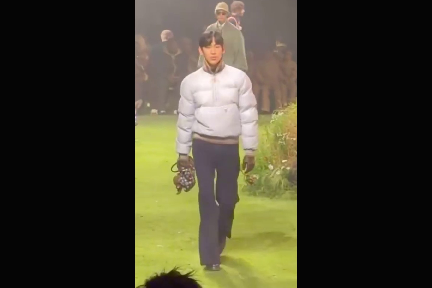 How K-pop Fashion-Week News Gets Verified Before It Reaches SEOULVERSE. Archive image: BamBam at a 2026 Louis Vuitton runway; not evidence of current Paris Fashion Week attendance.